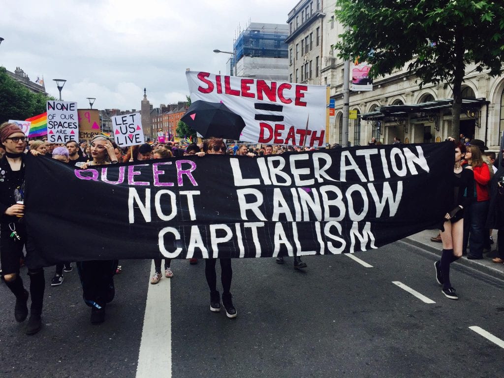 Queer liberation not rainbow capitalism banner