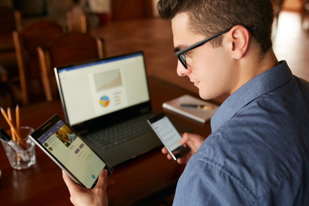 An image of a person with multiple devices 