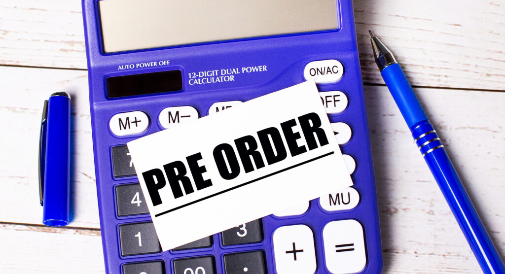 A calculator with a pre order sign 